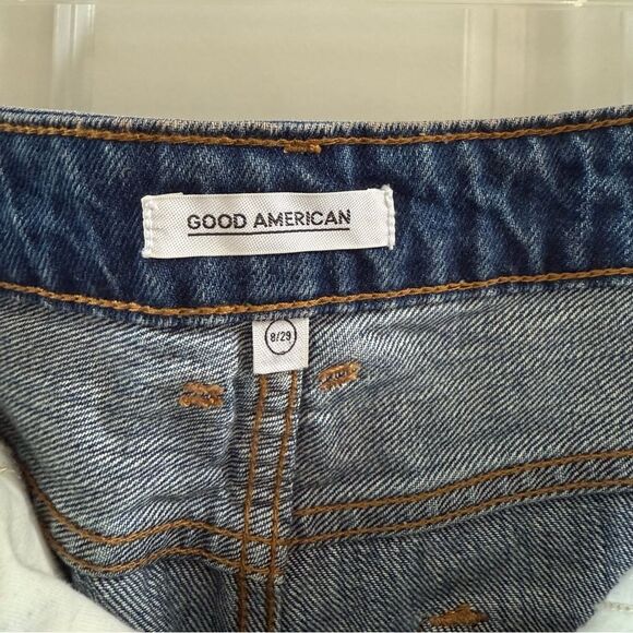 Good American Step Hem Jean Denim Mini Skirt. Distressed Medium Wash. Size 8/29. - Picture 3 of 10